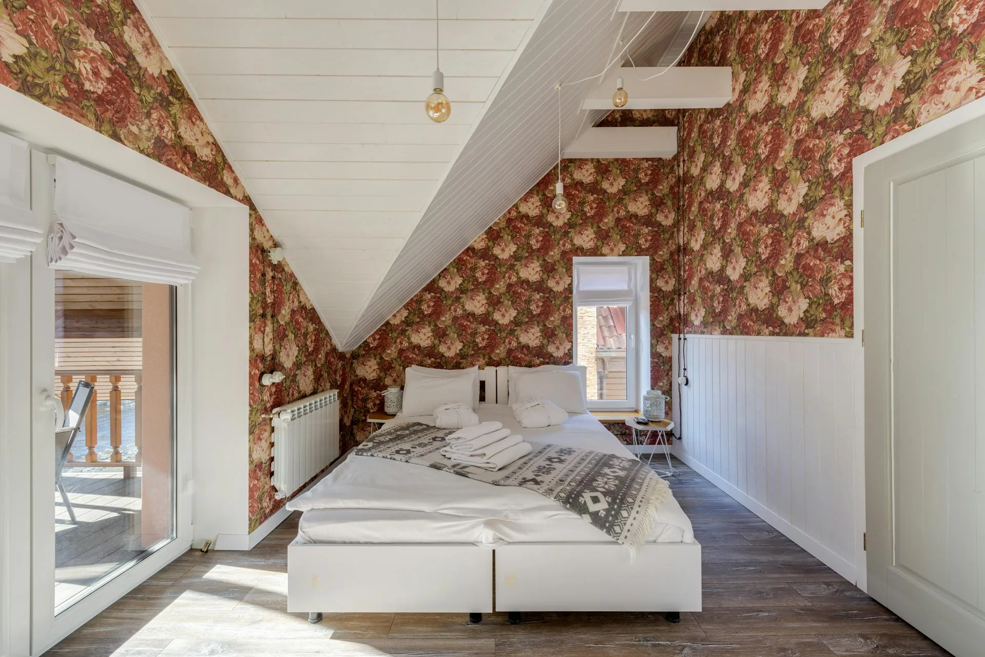 Expert wallpaper hanger performing precise installation in Bay Area home