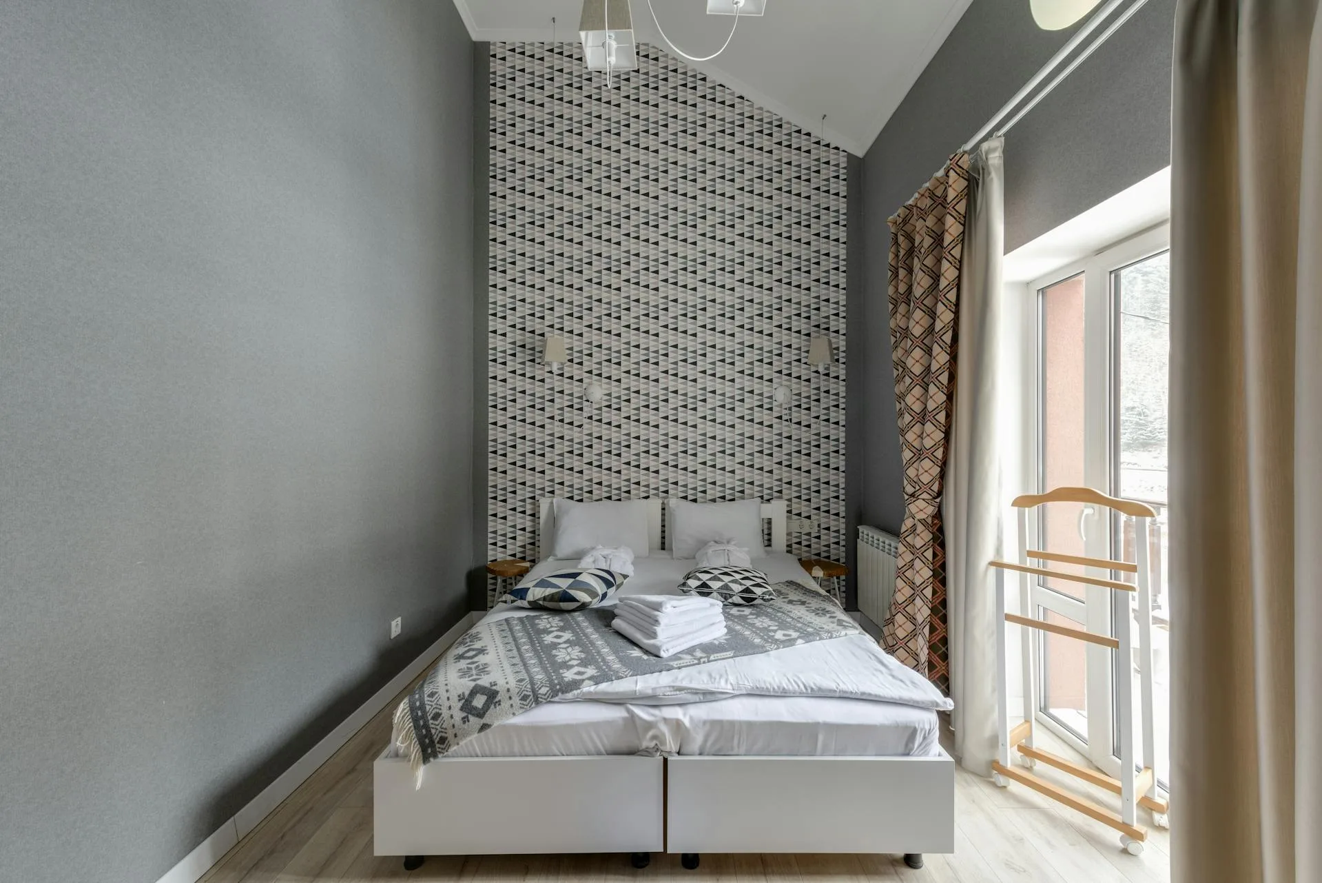 Wallpaper stripping and wall preparation showing clean surface after professional removal